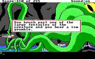 (message: You brush past one of the large tentacles of the creature and you hear a low rumble.)